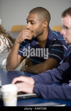 Students in classroom with cup of coffee Stock Photo