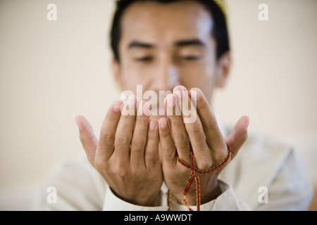 Close-up of hands praying Stock Photo
