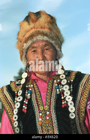 Portrait of an old woman in Altaic costume National Altaian cultural ...