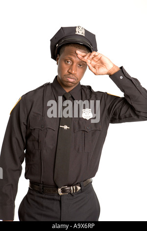 American policeman is baffled or exhausted by his job, wearing his uniform Stock Photo