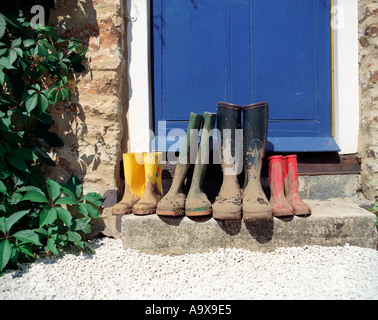 a family of wellington boots on the home Stock Photo