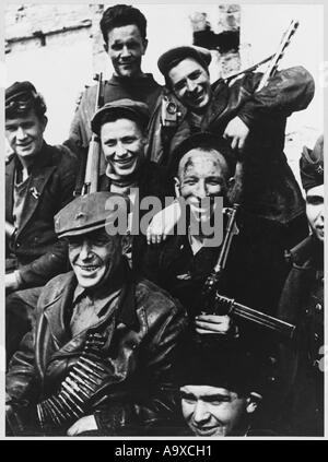 A group of cheerful Soviet Partisans at Odessa, on the Black Sea coast ...