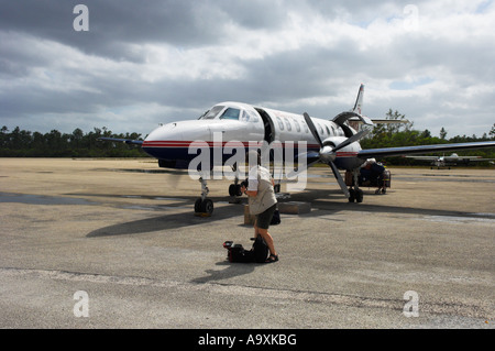 Bahamas Western Air inter island Metro III 19 seater twin engine turboprop aircraft on ground Andros Island airport Bahamas Stock Photo