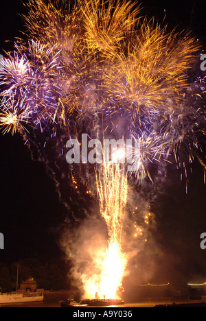 Explosion of Fireworks taken on bonfire night against a dark black night sky Stock Photo