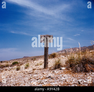 old sign post in middle of desert Stock Photo