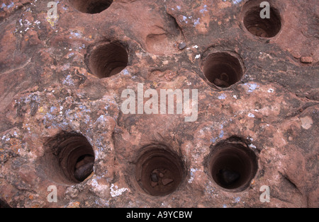 Pre Columbian mortar holes carved into rock, Talampaya National Park, Argentina Stock Photo