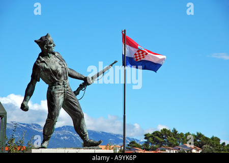Partisan memorial with Croatian flag in the village Rab, Island Rab, Croatia Stock Photo