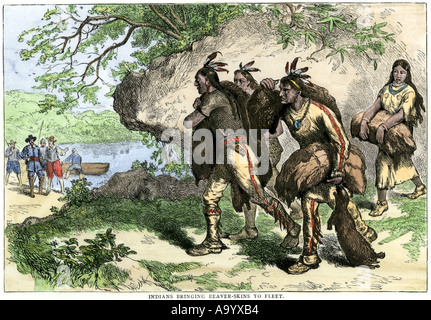 French fur traders and Native Americans dancing at a rendezvous in the ...