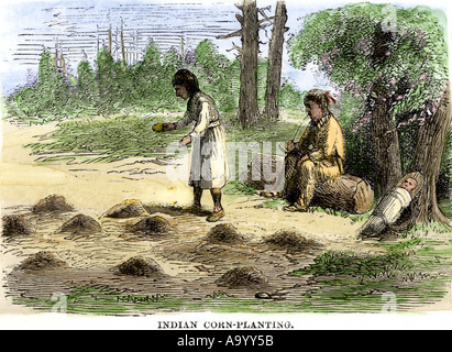 Native American family planting maize. Hand-colored woodcut Stock Photo