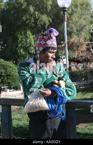 A traditional Bolivian man,   campesino, peasant wearing a colourful woollen hat in Llallagua, Potosi, Bolivia Stock Photo