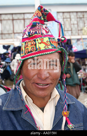 Traditional Bolivian man, peasant, campesino  in a colourful woollen hat Stock Photo