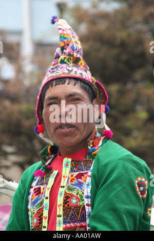 Traditional Bolivian man, peasant, campesino in a colourful woollen hat ...