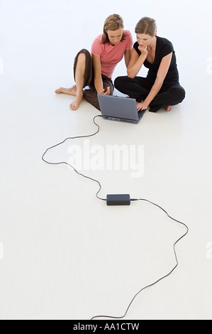 Colleagues working on laptop Stock Photo
