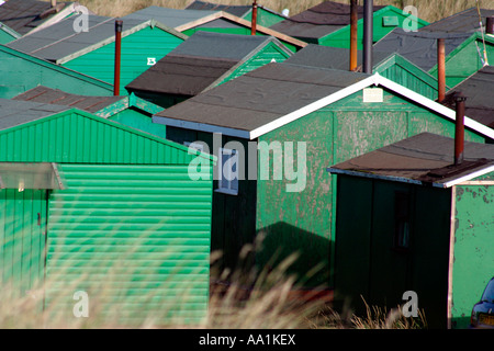 Green sheds at the south gare of the mouth of the river tees Stock Photo