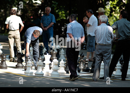 Mature Men Playing street Chess in Banja Luka, Bosnia Herzegovina. Stock Photo