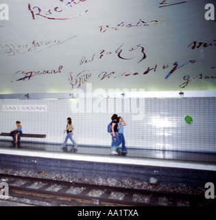 France, Paris, young people on metro platform Stock Photo