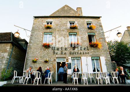 France, Vezelay, people in front of small hotel, low angle view Stock Photo
