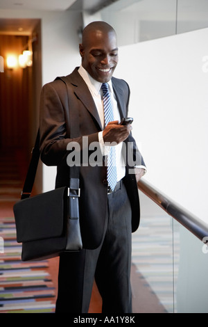Businessman with Cellular Phone Stock Photo