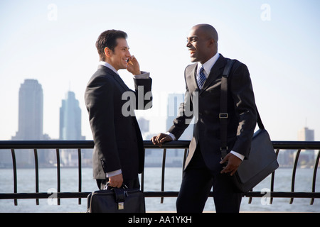 Businessmen Talking Outdoors Stock Photo