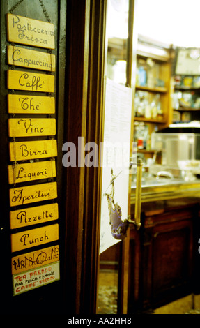 Italy, Venice, A cafe entrance San Marco, wooden menu by open door of cafe Stock Photo