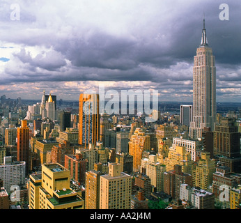 Aerial View of Empire State Building Midtown Manhattan New York City USA on a cloudy day. National Historic Landmark Stock Photo