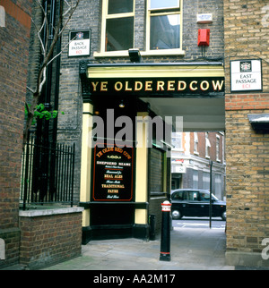 A passageway next to 'Ye Olde Red Cow' pub Smithfield London, England, UK  KATHY DEWITT Stock Photo