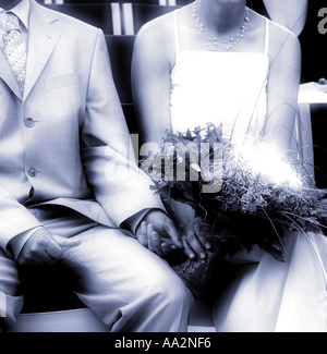 bridal couple holding hands Stock Photo