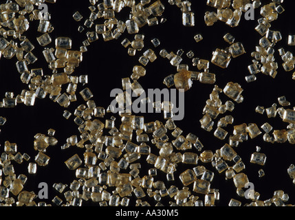 An extreme Close Up Of Brown Sugar granules Stock Photo