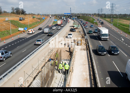 M1 widening scheme between junctions 6A & 10 Stock Photo - Alamy