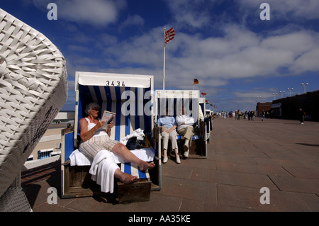 Sylt beach chairs on the boulevard of Westerland Stock Photo