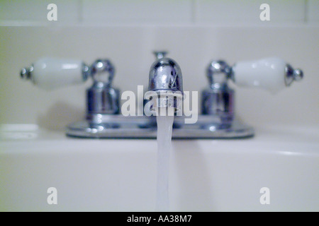 Sink with water running Stock Photo