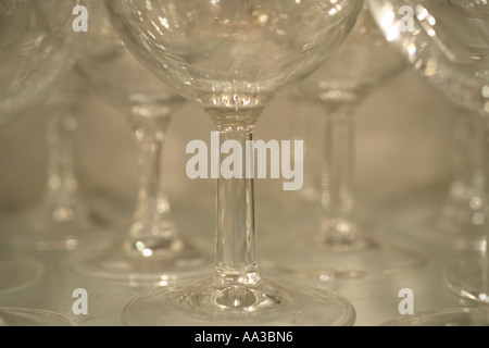 'Wine glasses' on glass shelf in cupboard Stock Photo