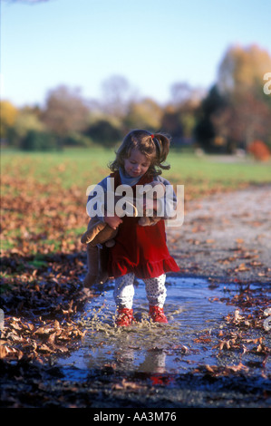 Girl playing with stuffed animals in a teepee Stock Photo - Alamy
