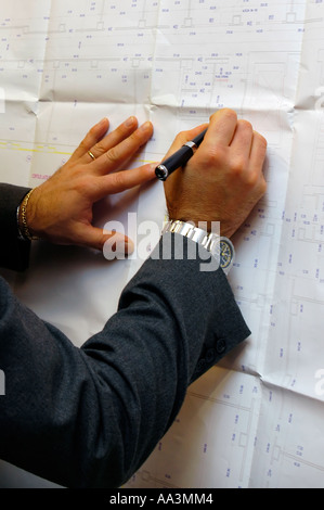 Working on blueprints Stock Photo