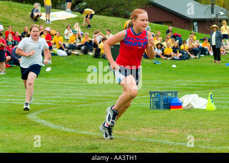 Girls running in primary school sports Stock Photo
