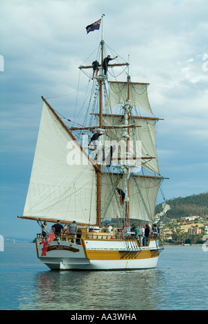 Square rigged ship Lady Nelson sailing on the Derwent River in Tasmania Stock Photo