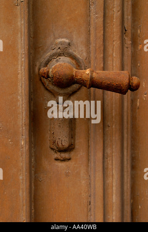 Old rusty door buckle Stock Photo
