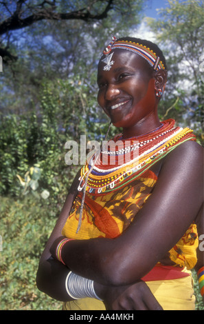 Pretty young Samburu woman wearing brightly coloured bead necklaces and headbands Northern Kenya East Africa Stock Photo