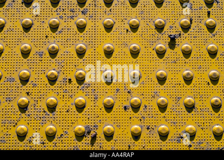 Close up of yellow non skid sidewalk covering Stock Photo