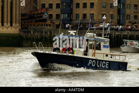 Police patrol boat the Sir Robert Peel on the River Thames London England UK Stock Photo