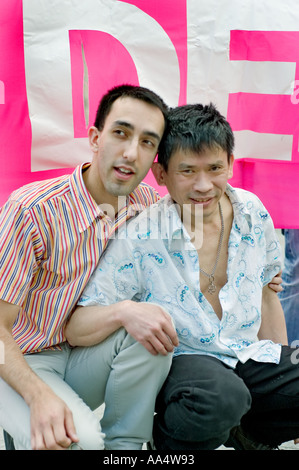Portrait of Gay Male Couple Partners different national couples  in Domestic Union, one Asian, queer couples Stock Photo
