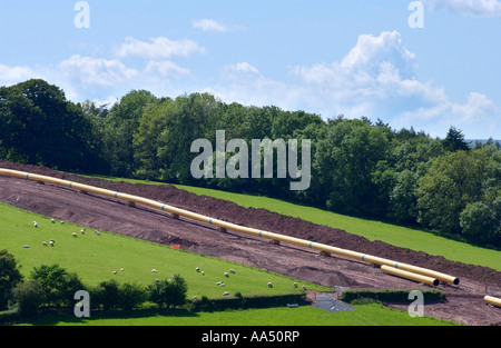 LNG pipeline being constructed on hillside  farmland above Hay on Wye Powys Wales UK Stock Photo