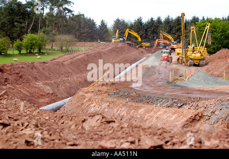 LNG pipeline being constructed over farmland near Trecastle Powys South Wales UK GB EU Stock Photo