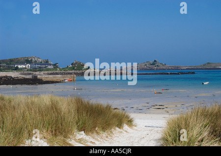 Beach at Green Porth, Old Grimsby, Tresco, Isles of Scilly with the Island Hotel in distance Stock Photo