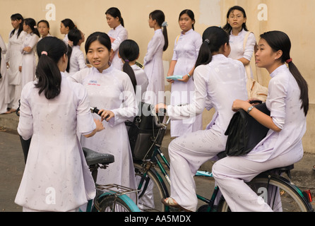 Hoi An, Vietnam. Students dressed in Ao Dai Stock Photo