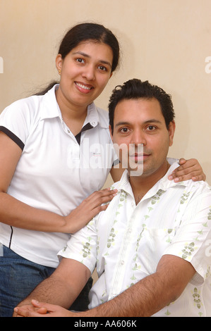 ANG104061 Young Indian couple looking at camera Model release 468 Stock Photo