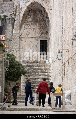 Kids Playing Football in Narrow Dubrovnik Street Croatia Stock Photo