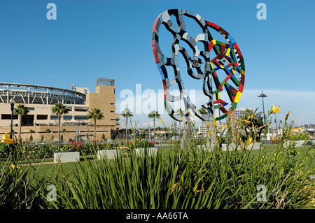 A mosaic sculpture entitled Coming Together by Niki de St Phalle with Petco Park in the background in San Diego, California, USA Stock Photo