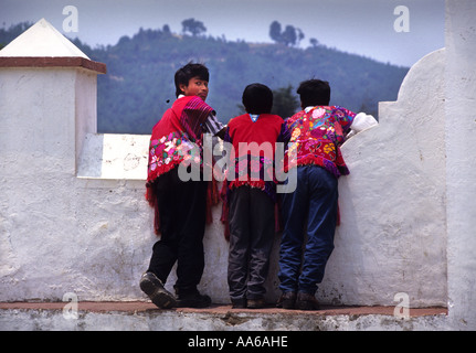 THREE ZINACANTAN MAYAN INDIAN BOYS IN SAN LORENZO ZINACANTAN CHIAPAS MEXICO Stock Photo