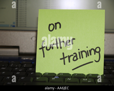 memo note on notebook on further training Stock Photo